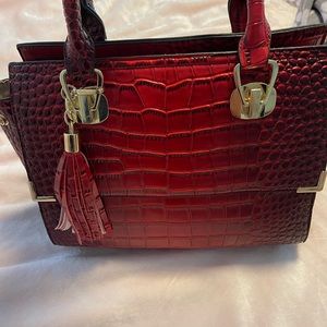 Red crocodile handbag with pockets